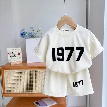 קיץ סגנון קוריאני חליפה לבנות עם שרוול קצר חולצת טי מכנסי כותנה מודפס תלבושות תינוקות בנים ספורט מזדמן אופנתי שני חלקים
